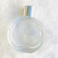 50ml Flat Round Silver Lid Bottle